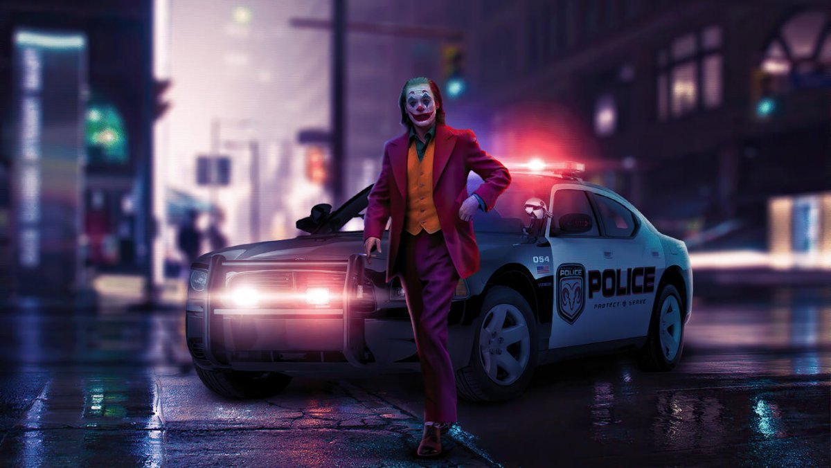 Джокер в полицейской машине обои фото